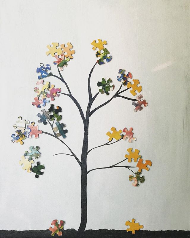Puzzle-piece tree artwork created by the clients at the Sunrise Adult Training Centre